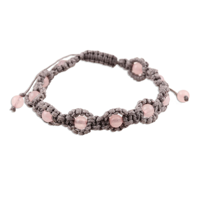 Rose quartz beaded bracelet, 'Macrame Halo' - Rose Quartz Macrame Hand-Knotted Bracelet from India