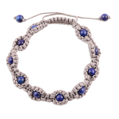 Lapis lazuli beaded bracelet, 'Macrame Halo' - Lapis Lazuli Macrame Hand-Knotted Bracelet from India