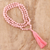 Lange Halskette aus Rosenquarz, 'Contemporary Chic'. - Handgeknüpfte Halskette mit langer Quaste aus rosa Rosenquarz