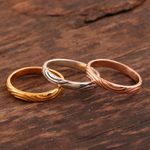 Gold plated and sterling silver stacking rings, 'Triple Union' (set of 3) - Gold and Silver Engraved Stacking Band Rings (Set of 3)