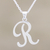 Anhänger-Halskette aus Sterlingsilber, 'Dancing R - Handwerklich gefertigte R Initialen-Halskette aus Indien