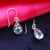 Blue topaz dangle earrings, 'Blue Droplets' - Teardrop Faceted Blue Topaz Silver Dangle Earrings