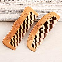 Wood combs, 'Floral Delight' (pair) - Cane Wood Hand Carved Set of 2 Combs