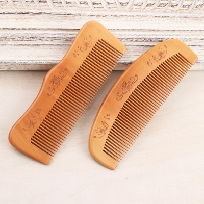 Wood combs, 'Floral Delight' (pair) - Cane Wood Hand Carved Set of 2 Combs