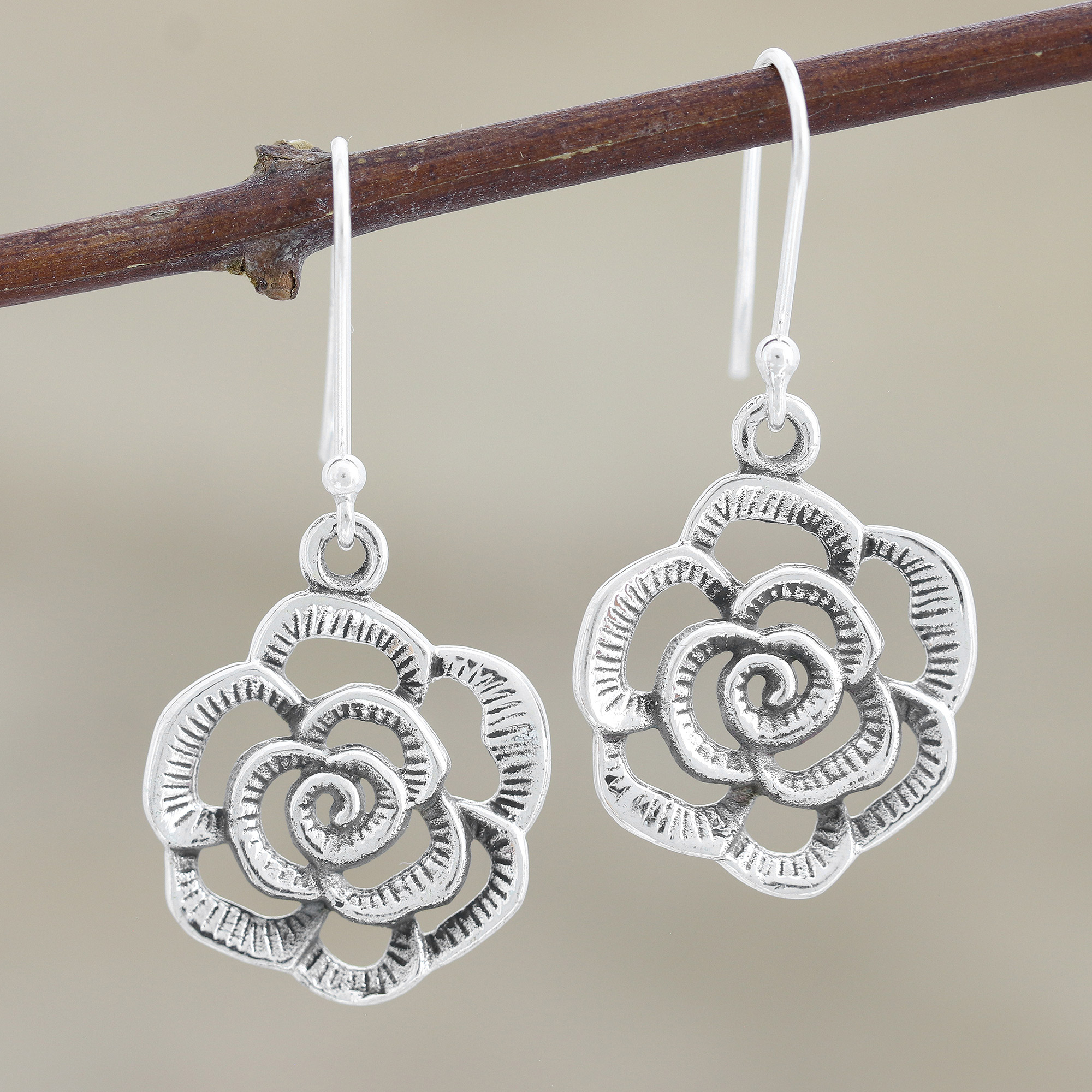 Silver rose dangle earrings