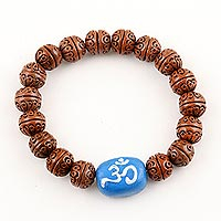 Terracotta beaded unity bracelet, 'Omkara Unity' - Handcrafted Indian Brown & Blue Terracotta Unity Bracelet