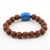 Terracotta beaded unity bracelet, 'Omkara Unity' - Handcrafted Indian Brown & Blue Terracotta Unity Bracelet