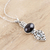 Garnet and blue topaz pendant necklace, 'Sparkling Radiance' - Garnet and Blue Topaz Sterling Silver Pendant Necklace