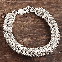 Men's sterling silver link bracelet, 'Intertwining Circles' - Men's Chunky Sterling Silver Link Bracelet