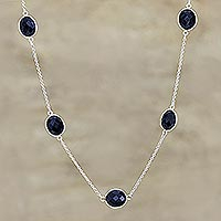 Long onyx station necklace, 'Captured Innocence' - Long Black Onyx Station Necklace