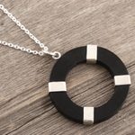 Sterling silver and ebony wood pendant necklace, 'Bright Ring' - Hand Crafted Sterling Silver and Ebony Wood Pendant Necklace