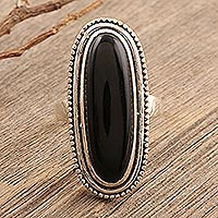 Onyx cocktail ring, 'Midnight Bliss' - Oval Black Onyx Cabochon Sterling Silver Cocktail Ring