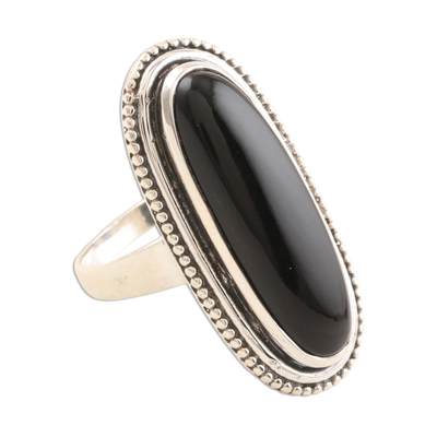 Onyx cocktail ring, 'Midnight Bliss' - Oval Black Onyx Cabochon Sterling Silver Cocktail Ring