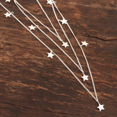 Sterling silver charm necklace, 'Starry Eyes' - Hand Crafted Sterling Silver Star Charm Necklace