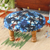 Upholstered ottoman foot stool, 'Flower Majesty' - TIe-Dyed Floral Ottoman with Wood Legs thumbail