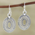 Sterling silver dangle earrings, 'Learning Curve' - Hand Crafted Sterling Silver Dangle Earrings from India (image 2) thumbail