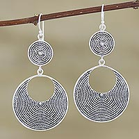 Sterling silver dangle earrings, 'Mesmerized' - Hand Crafted Sterling Silver Dangle Earrings from India