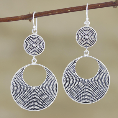 Sterling silver dangle earrings, 'Mesmerized' - Hand Crafted Sterling Silver Dangle Earrings from India