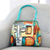 Hand painted leather shoulder bag, 'Enlightened One' - Hand Painted Buddha-Themed Leather Shoulder Bag thumbail