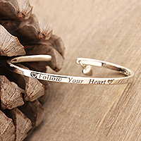 Sterling silver cuff bracelet, 'Follow your Heart' - Hand Made Sterling Silver Heart Charm Cuff Bracelet