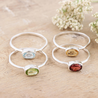 Gemstone single stone rings, 'Four Corners' (set of 4) - Peridot and Garnet Single Stone Rings (Set of 4)