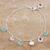 Multi-gemstone charm bracelet, 'Prismatic Fusion' - Amethyst and Rose Quartz Charm Bracelet