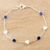 Onyx station bracelet, 'Blue Shine' - Sterling Silver and Blue Onyx Station Bracelet