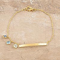 Gold-plated multi-gemstone charm bracelet, 'Light as Air' - Gold-Plated Chalcedony and Blue Topaz Charm Bracelet