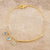 Gold-plated multi-gemstone charm bracelet, 'Light as Air' - Gold-Plated Chalcedony and Blue Topaz Charm Bracelet