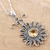 Citrine pendant necklace, 'Floral Games' - Sterling Silver and Citrine Pendant Necklace