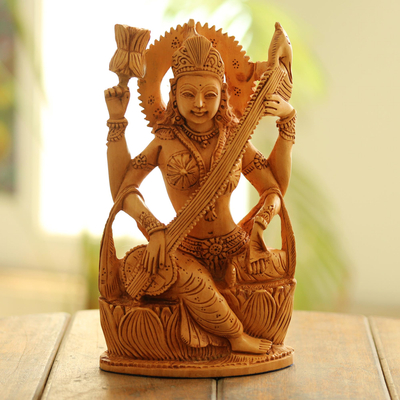 Wood sculpture, Saraswati Plays