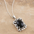 Onyx pendant necklace, 'Black Botanicals' - Sterling Silver and Onyx Pendant Necklace