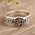 Sterling silver band ring, 'Entwined Universe' - Sterling Silver Band Ring with Om Motif (image 2) thumbail