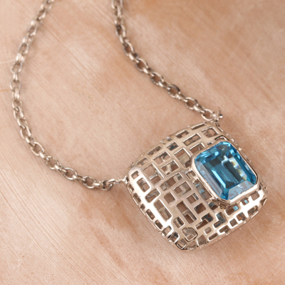 Blue topaz pendant necklace, 'Open Plaza in Silver' - Blue Topaz and Sterling Silver Pendant Necklace