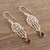 Garnet dangle earrings, 'Hamsa Protection' - Sterling Silver Hamsa Style Dangle Earrings with Garnet