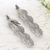 Aluminum incense holders, 'Sitting Ganesha' (pair) - Artisan Crafted Ganesha Incense Holders (Pair)