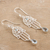Blue topaz dangle earrings, 'Hamsa Protection' - Sterling Silver Hamsa Style Dangle Earrings with Blue Topaz (image 2b) thumbail