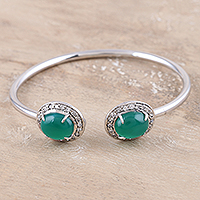 Onyx cuff bracelet, 'Sparkling Green Eyes' - Sterling Silver Cuff Bracelet with Green Onyx Ends
