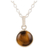 Tiger's eye pendant necklace, 'Swing Low in Brown' - Indian Tiger's Eye and Sterling Silver Pendant Necklace thumbail