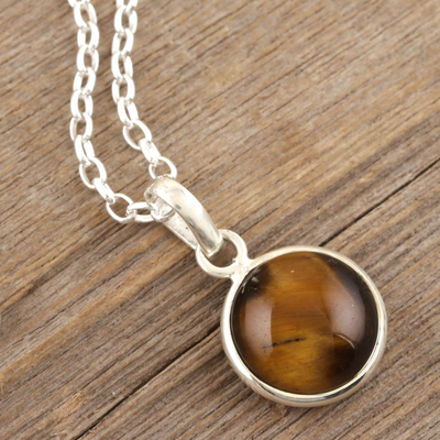 Tiger's eye pendant necklace, 'Swing Low in Brown' - Indian Tiger's Eye and Sterling Silver Pendant Necklace