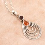 Garnet and carnelian pendant necklace, 'Radiate in Red' - Hand Made Garnet and Carnelian Pendant Necklace