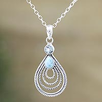 Larimar and blue topaz pendant necklace, 'Radiate in Blue' - Artisan Crafted Larimar and Blue Topaz Pendant Necklace