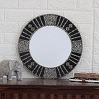 Embossed metal wall mirror, 'Floral Dreams' - Artisan Crafted Wall Mirror from India