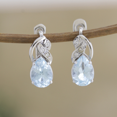 Rhodium-plated blue topaz and cubic zirconia drop earrings, 'Free People in Blue' - Rhodium-Plated Blue Topaz Drop Earrings