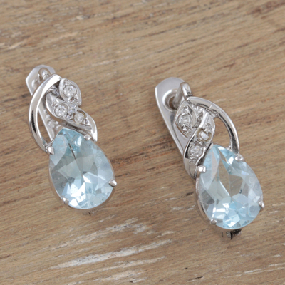 Rhodium-plated blue topaz and cubic zirconia drop earrings, 'Free People in Blue' - Rhodium-Plated Blue Topaz Drop Earrings