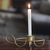 Iron candle holder, 'Twisted Delight' - Gold Powder-coated Iron Candle Holder Hand Crafted in India