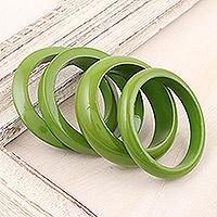 Mango wood bangle bracelets, 'Olive Fusion' (set of 4) - Set of 4 Mango Wood Green Bangle Bracelets from India
