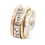 Multi-metal meditation spinner ring, 'Endearing Hearts' - Sterling Silver Brass and Copper Meditation Spinner Ring