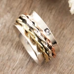 Multi-metal meditation spinner ring, 'Twisted Spin' - Sterling Silver Brass and Copper Meditation Spinner Ring