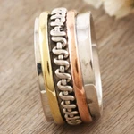 Multi-metal meditation spinner ring, 'Knotted Delight' - Sterling Silver Brass and Copper Meditation Spinner Ring